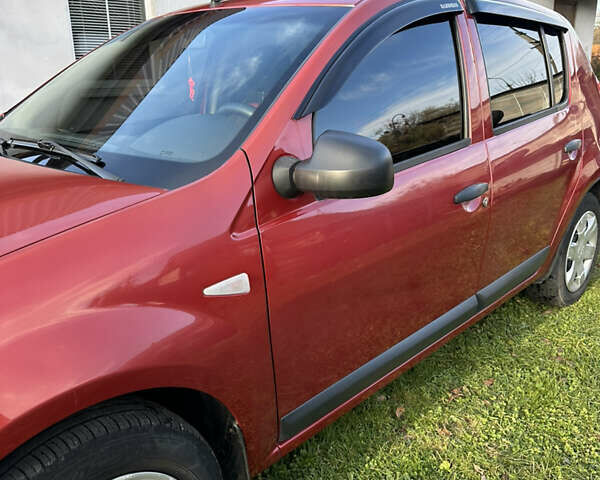 Червоний Дачія Sandero, об'ємом двигуна 1.4 л та пробігом 180 тис. км за 4800 $, фото 10 на Automoto.ua