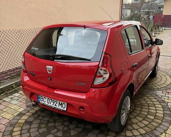 Червоний Дачія Sandero, об'ємом двигуна 1.4 л та пробігом 131 тис. км за 4000 $, фото 6 на Automoto.ua