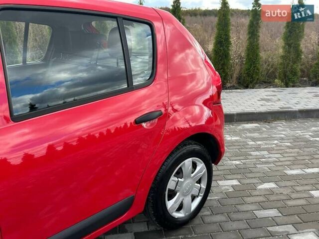 Дачія Sandero 2009 у Луцьку на Automoto.ua Червоний Дачія Sandero, об'ємом двигуна 1.4 л та пробігом 212 тис. км за 3950 $, фото 6 на Automoto.ua