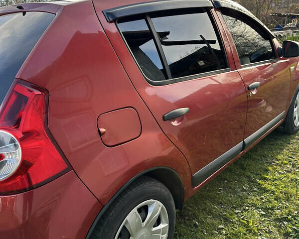 Червоний Дачія Sandero, об'ємом двигуна 1.4 л та пробігом 180 тис. км за 4800 $, фото 4 на Automoto.ua