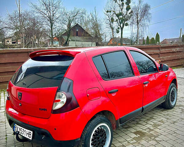 Красный Дачия Сандеро, объемом двигателя 1.39 л и пробегом 200 тыс. км за 3500 $, фото 5 на Automoto.ua