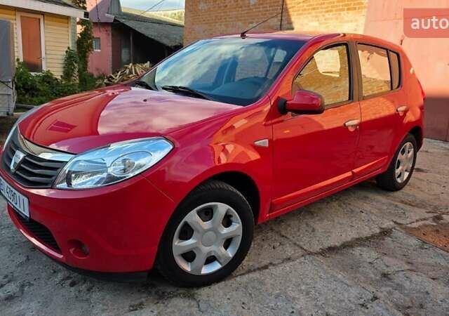 Красный Дачия Сандеро, объемом двигателя 1.4 л и пробегом 176 тыс. км за 5500 $, фото 5 на Automoto.ua