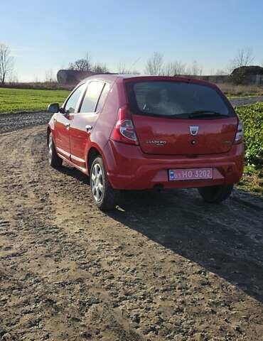 Красный Дачия Сандеро, объемом двигателя 1.4 л и пробегом 206 тыс. км за 4300 $, фото 5 на Automoto.ua
