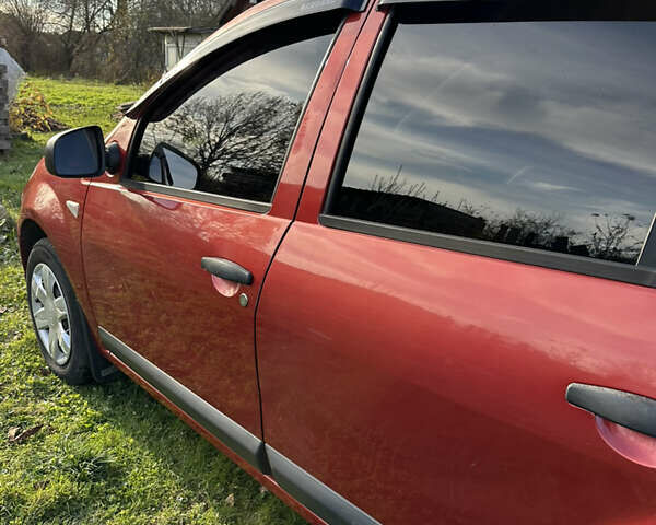 Червоний Дачія Sandero, об'ємом двигуна 1.4 л та пробігом 180 тис. км за 4800 $, фото 9 на Automoto.ua