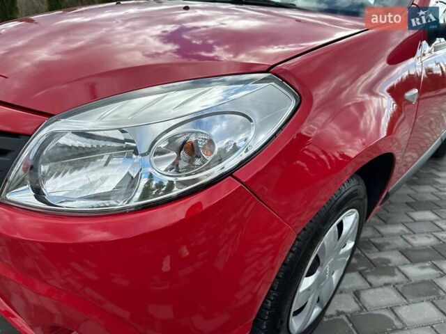 Дачія Sandero 2009 у Луцьку на Automoto.ua Червоний Дачія Sandero, об'ємом двигуна 1.4 л та пробігом 212 тис. км за 3950 $, фото 5 на Automoto.ua