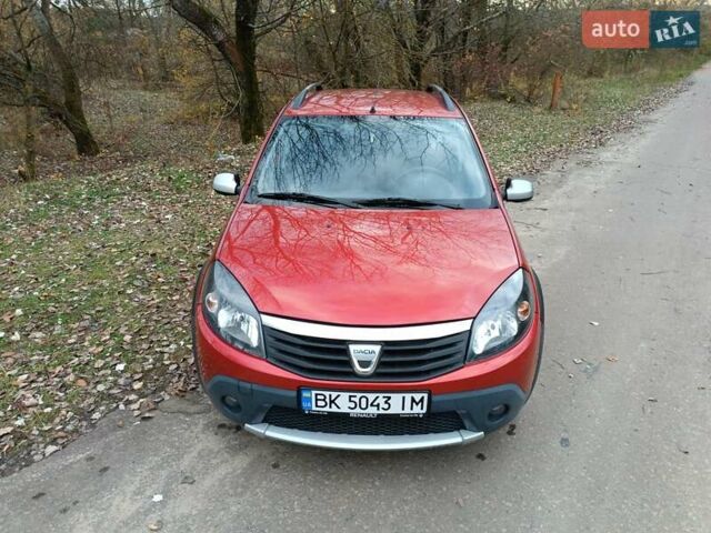 Красный Дачия Сандеро, объемом двигателя 1.6 л и пробегом 145 тыс. км за 7200 $, фото 23 на Automoto.ua
