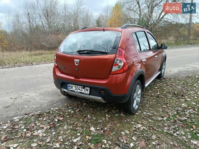 Красный Дачия Сандеро, объемом двигателя 1.6 л и пробегом 145 тыс. км за 7200 $, фото 13 на Automoto.ua