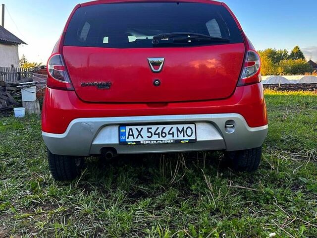 Красный Дачия Сандеро, объемом двигателя 1.4 л и пробегом 133 тыс. км за 5000 $, фото 1 на Automoto.ua