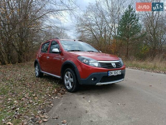 Красный Дачия Сандеро, объемом двигателя 1.6 л и пробегом 145 тыс. км за 7200 $, фото 4 на Automoto.ua