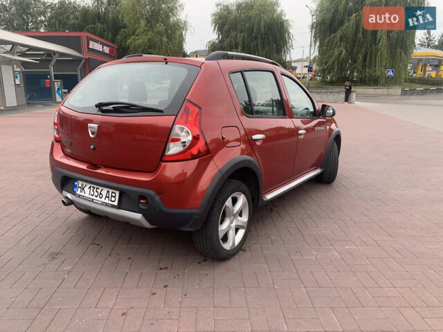 Червоний Дачія Sandero, об'ємом двигуна 1.6 л та пробігом 173 тис. км за 6300 $, фото 9 на Automoto.ua