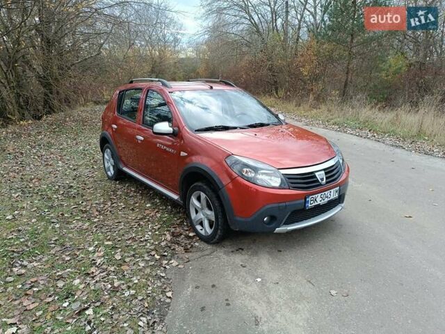 Красный Дачия Сандеро, объемом двигателя 1.6 л и пробегом 145 тыс. км за 7200 $, фото 2 на Automoto.ua