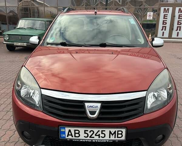 Дачия Сандеро 2011 в Виннице на Automoto.ua Красный Дачия Сандеро, объемом двигателя 1.6 л и пробегом 115 тыс. км за 6950 $, фото 8 на Automoto.ua