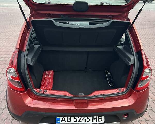 Дачия Сандеро 2011 в Виннице на Automoto.ua Красный Дачия Сандеро, объемом двигателя 1.6 л и пробегом 115 тыс. км за 6950 $, фото 9 на Automoto.ua