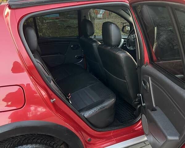 Красный Дачия Сандеро, объемом двигателя 1.6 л и пробегом 218 тыс. км за 5700 $, фото 12 на Automoto.ua