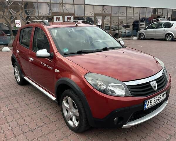 Дачия Сандеро 2011 в Виннице на Automoto.ua Красный Дачия Сандеро, объемом двигателя 1.6 л и пробегом 115 тыс. км за 6950 $, фото 6 на Automoto.ua
