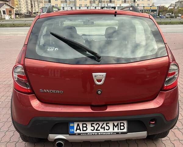 Дачия Сандеро 2011 в Виннице на Automoto.ua Красный Дачия Сандеро, объемом двигателя 1.6 л и пробегом 115 тыс. км за 6950 $, фото 3 на Automoto.ua