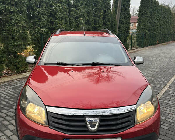 Красный Дачия Сандеро, объемом двигателя 1.6 л и пробегом 166 тыс. км за 5699 $, фото 3 на Automoto.ua