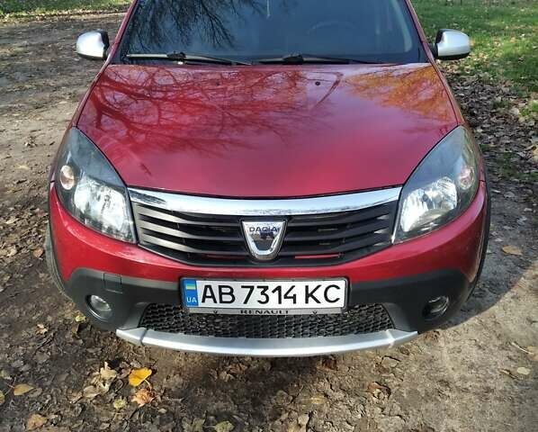 Червоний Дачія Sandero, об'ємом двигуна 1.6 л та пробігом 185 тис. км за 6500 $, фото 2 на Automoto.ua