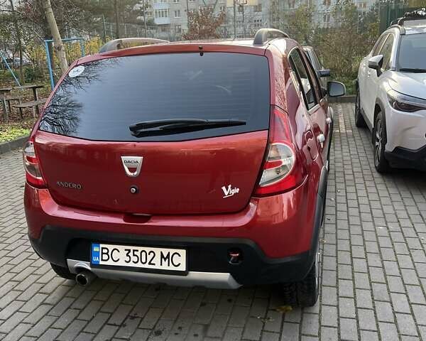 Красный Дачия Сандеро, объемом двигателя 1.6 л и пробегом 218 тыс. км за 5700 $, фото 6 на Automoto.ua