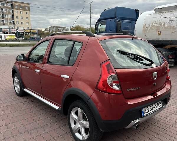 Дачия Сандеро 2011 в Виннице на Automoto.ua Красный Дачия Сандеро, объемом двигателя 1.6 л и пробегом 115 тыс. км за 6950 $, фото 2 на Automoto.ua