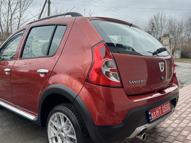 Красный Дачия Сандеро, объемом двигателя 1.6 л и пробегом 172 тыс. км за 6799 $, фото 22 на Automoto.ua