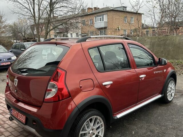 Красный Дачия Сандеро, объемом двигателя 1.6 л и пробегом 172 тыс. км за 6799 $, фото 3 на Automoto.ua