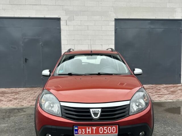 Красный Дачия Сандеро, объемом двигателя 1.6 л и пробегом 172 тыс. км за 6799 $, фото 2 на Automoto.ua