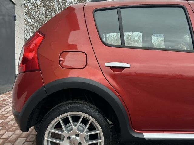 Красный Дачия Сандеро, объемом двигателя 1.6 л и пробегом 172 тыс. км за 6799 $, фото 20 на Automoto.ua