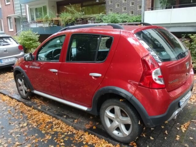 Червоний Дачія Sandero, об'ємом двигуна 2 л та пробігом 200 тис. км за 6398 $, фото 1 на Automoto.ua