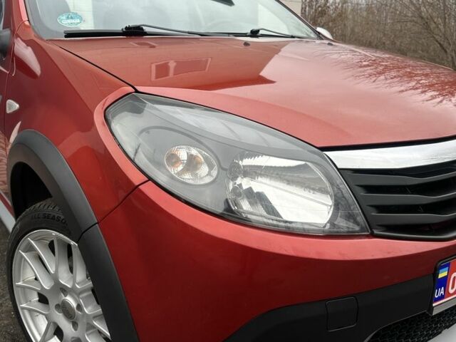 Красный Дачия Сандеро, объемом двигателя 1.6 л и пробегом 172 тыс. км за 6799 $, фото 16 на Automoto.ua