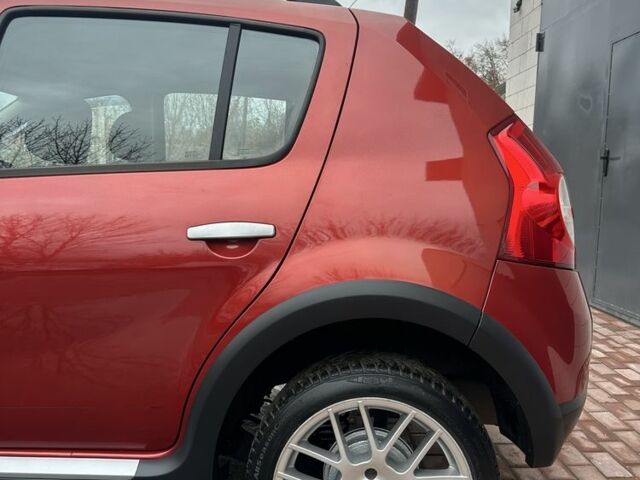 Красный Дачия Сандеро, объемом двигателя 1.6 л и пробегом 172 тыс. км за 6799 $, фото 21 на Automoto.ua