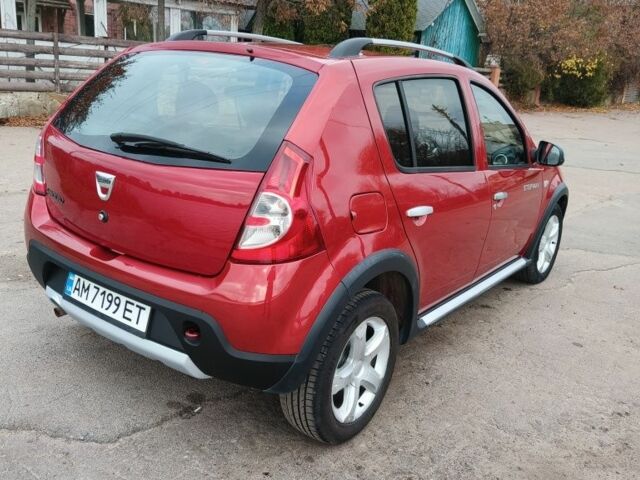 Красный Дачия Сандеро, объемом двигателя 1.6 л и пробегом 162 тыс. км за 6400 $, фото 1 на Automoto.ua