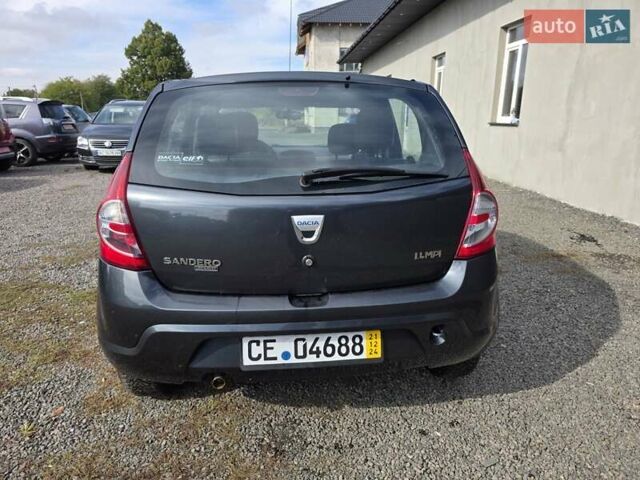 Сірий Дачія Sandero, об'ємом двигуна 1.4 л та пробігом 200 тис. км за 4750 $, фото 2 на Automoto.ua