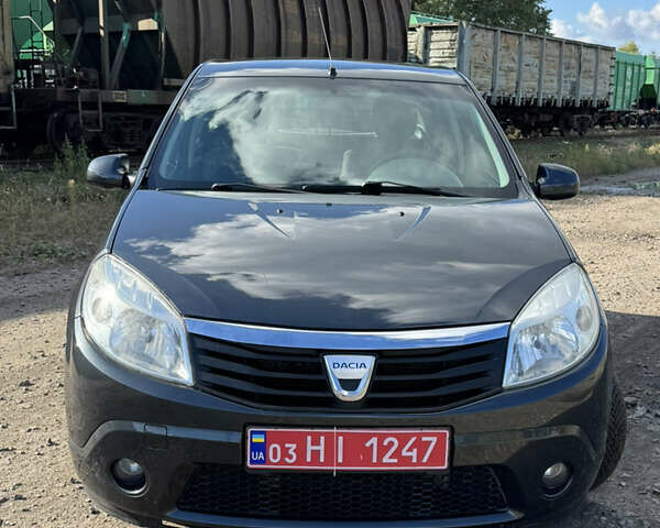 Сірий Дачія Sandero, об'ємом двигуна 1.4 л та пробігом 173 тис. км за 5500 $, фото 12 на Automoto.ua