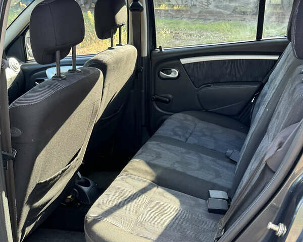 Сірий Дачія Sandero, об'ємом двигуна 1.4 л та пробігом 173 тис. км за 5500 $, фото 13 на Automoto.ua