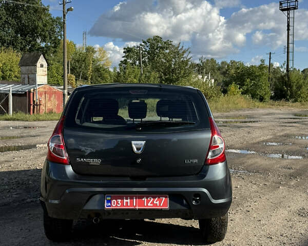 Сірий Дачія Sandero, об'ємом двигуна 1.4 л та пробігом 173 тис. км за 5500 $, фото 6 на Automoto.ua