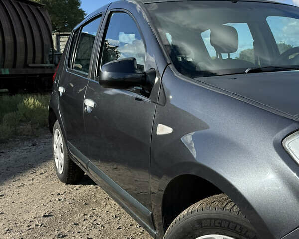 Сірий Дачія Sandero, об'ємом двигуна 1.4 л та пробігом 173 тис. км за 5500 $, фото 11 на Automoto.ua