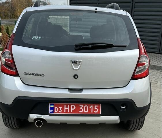 Серый Дачия Сандеро, объемом двигателя 1.6 л и пробегом 175 тыс. км за 6600 $, фото 2 на Automoto.ua