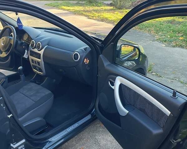 Сірий Дачія Sandero, об'ємом двигуна 1.6 л та пробігом 129 тис. км за 6150 $, фото 17 на Automoto.ua