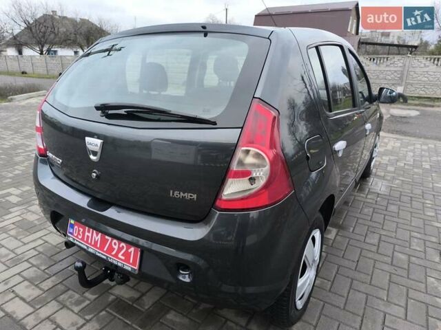 Серый Дачия Сандеро, объемом двигателя 1.6 л и пробегом 197 тыс. км за 5600 $, фото 5 на Automoto.ua