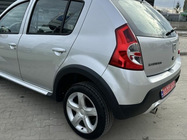 Серый Дачия Сандеро, объемом двигателя 1.6 л и пробегом 175 тыс. км за 6600 $, фото 3 на Automoto.ua