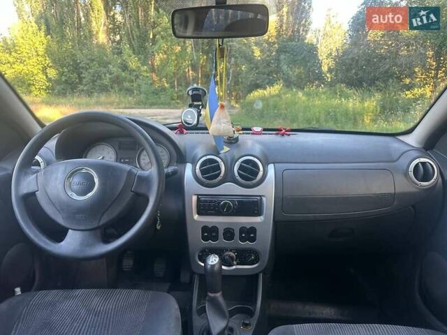 Сірий Дачія Sandero, об'ємом двигуна 1.6 л та пробігом 273 тис. км за 5000 $, фото 11 на Automoto.ua