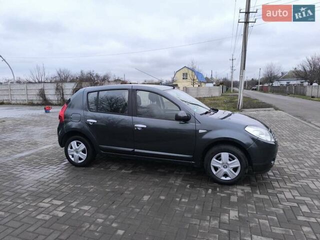 Серый Дачия Сандеро, объемом двигателя 1.6 л и пробегом 197 тыс. км за 5600 $, фото 2 на Automoto.ua