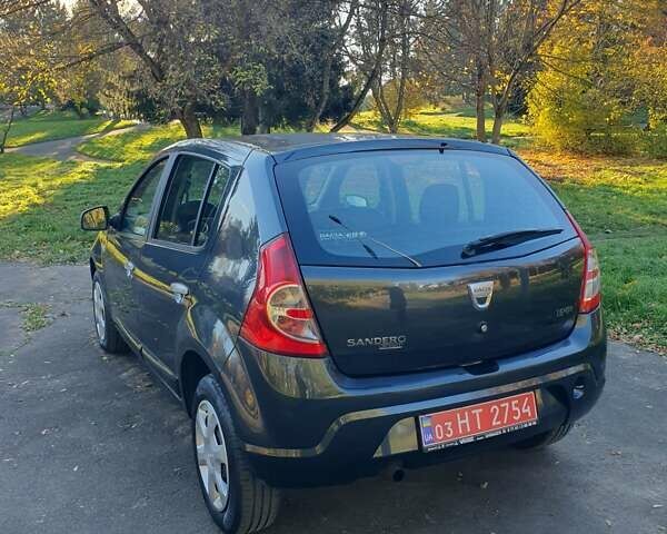 Сірий Дачія Sandero, об'ємом двигуна 1.6 л та пробігом 129 тис. км за 6150 $, фото 6 на Automoto.ua