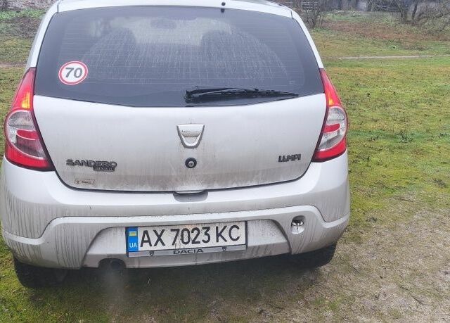 Серый Дачия Сандеро, объемом двигателя 1.4 л и пробегом 215 тыс. км за 4500 $, фото 2 на Automoto.ua