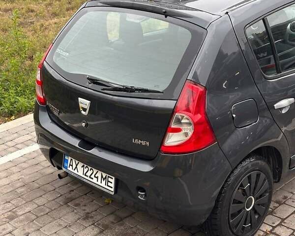 Серый Дачия Сандеро, объемом двигателя 1.6 л и пробегом 140 тыс. км за 4800 $, фото 3 на Automoto.ua