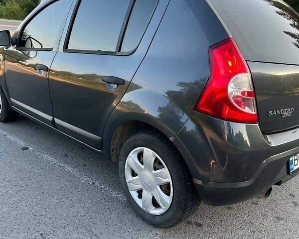 Серый Дачия Сандеро, объемом двигателя 1.2 л и пробегом 480 тыс. км за 2900 $, фото 6 на Automoto.ua