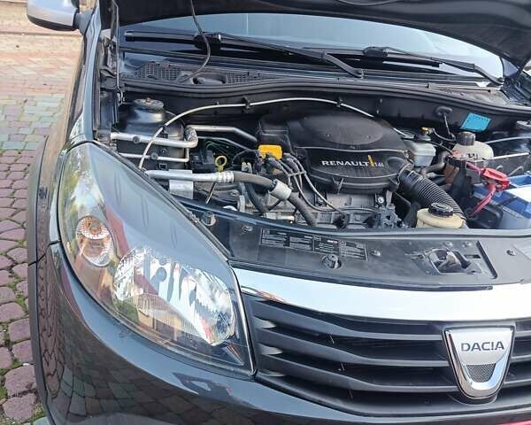 Сірий Дачія Sandero, об'ємом двигуна 1.6 л та пробігом 110 тис. км за 6990 $, фото 22 на Automoto.ua