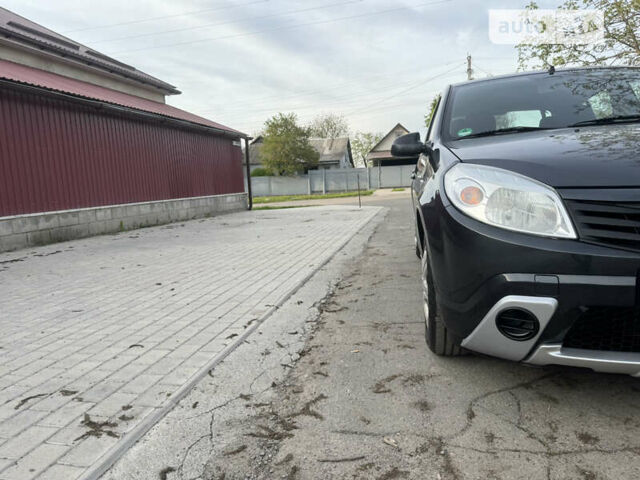 Сірий Дачія Sandero, об'ємом двигуна 1.4 л та пробігом 235 тис. км за 5590 $, фото 10 на Automoto.ua