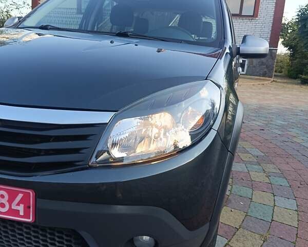 Сірий Дачія Sandero, об'ємом двигуна 1.6 л та пробігом 110 тис. км за 6990 $, фото 14 на Automoto.ua